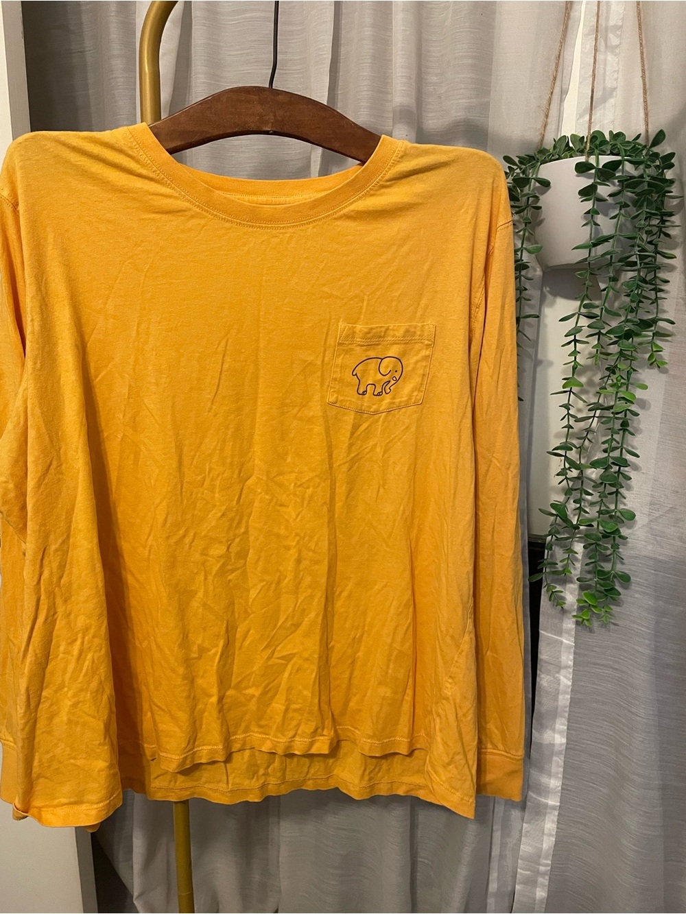 ivory ella Long-Sleeve Pocket Tee with dog on back